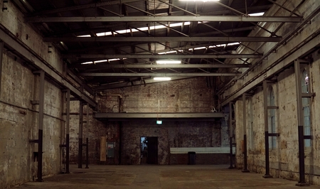 Inside of old abandon factory. A structure interior of industry warehouse. An abandon old factory...