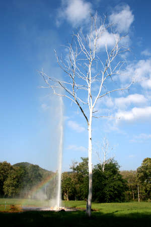 Rainbow and sky on park hot sprint at country Chiangmai, Thiland.の写真素材