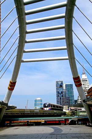 Building and electric train to look through the bridges at Chongnunzee in Bangkok, Thailand.の写真素材