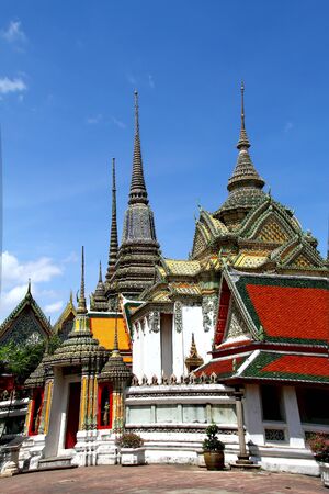 Church and architecture sharp pagoda with sky at Wat Pho temple in Bangkok,Thailand の写真素材
