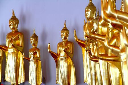 Buddha golden statue blessing hand, Wat Pho temple, Bangkok, Thailand 