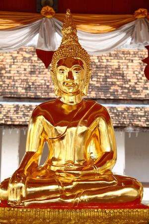 Beautiful sculpture buddha golden at Wat Phra That Chae Haeng, Nan province, Thailand の写真素材