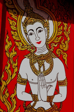 The angel smile welcome with tracery Thai Lanna at Wat Don keaw of Nan, Thailandの写真素材