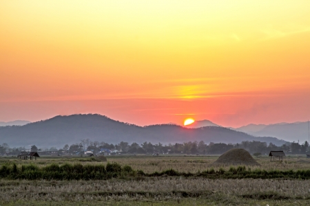 The sunset on hill at a village in Nan Thailand の写真素材