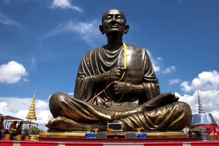Statue apostle of buddhism outdoor wiht blue sky at countryside, Thailandの写真素材