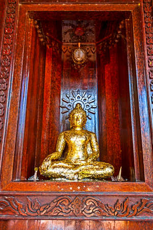 Statue buddha in church with palm wood at Prachuap Khirikhun Province, Thailandの写真素材