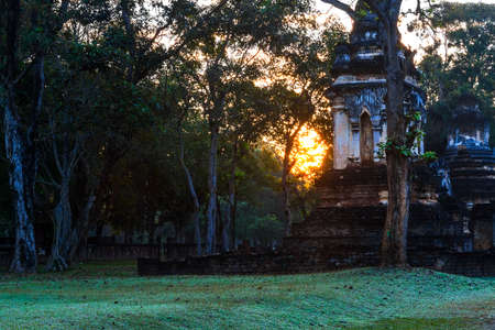Wat Chedi Chet Thaeo temple and sunrise in Sisatchanalai Historical Park, Sukhothai province Thailandの写真素材