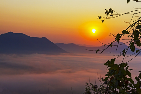 Sunrise beautiful with gold light in morning at viewpoint countyside in Thailandの写真素材