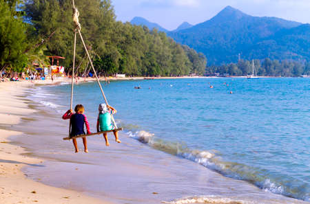 Traveler and family happy and play at beach  Koh Chang Thailand.
Koh Chang is located in the eastern Gulf of Thailand. It is an island with beautiful nature. Famous for tourismの写真素材