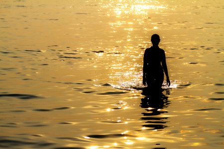 Sunset and silhouette people on beach at Koh Chang Thailand.の写真素材