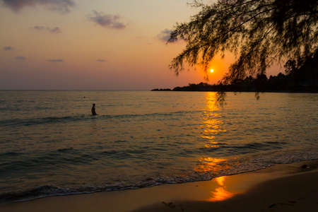 Sunset and traveler in the water on beach at Koh Chang Thailand.
Koh Chang is located in the eastern Gulf of Thailand. It is an island with beautiful nature. Famous for tourismの写真素材