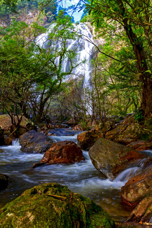 Khlong Lan Waterfall is beautiful in the rainy season and is a famous waterfall of Kamphaeng Phet Province, Thailand.の写真素材