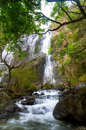 Khlong Lan Waterfall is beautiful in the rainy forest and is a famous waterfall of Kamphaeng Phet Province, Thailand.の写真素材