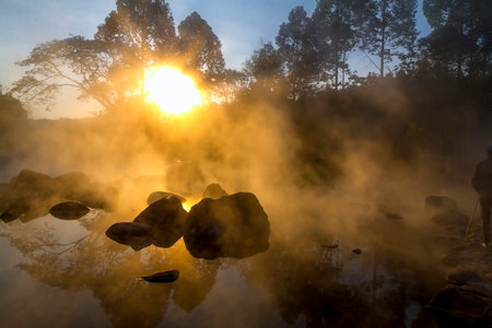 Hot springs with sunlight and sunrise in the morning at at Chae Son National Park , Lampang province Thailand.の写真素材