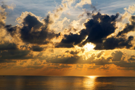 Sunrise on water in morning at beach Hat Ban Krut Prachuap Khiri Khan Province in Thailand is famous for travel and relaxの写真素材