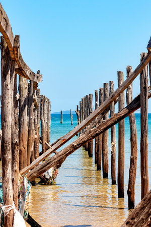 Ruins of the old bridge of fishing community at beach Bang Boat in Prachuap Khiri Khan Province, Thailand is famous for travel on nature.の写真素材