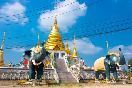 Architecture and golden statue on countryside in Prachuap Khiri Khan Province, Thailand.の写真素材