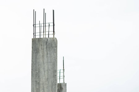 Old cement pillar in skyの写真素材
