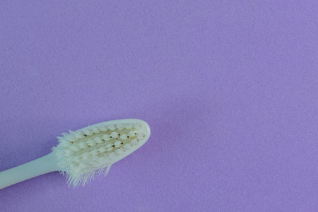 An old toothbrush on background.の写真素材