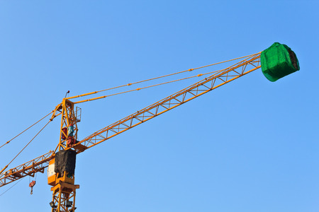 cranes and blue sky, thailandの写真素材