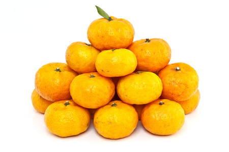 Oranges fresh from the garden on whiteの写真素材