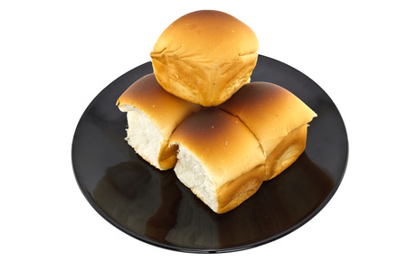 breads on plate on whiteの写真素材