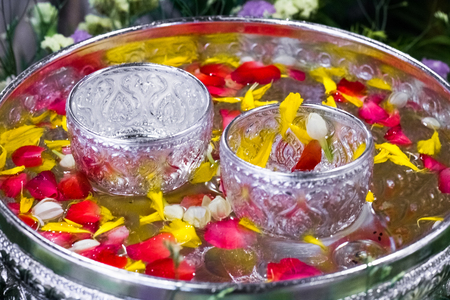 Songkran festival in Thailand,It use the water pouring to buddha statue and older.Cost-up,Clipping pathの写真素材