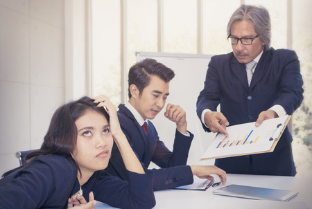 Senior managers thinking and meeting with business teamwork at office.Businessteam strain and bored to present project .Copy space.の写真素材