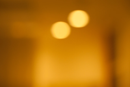 abstract blurred background, gold tone.の写真素材