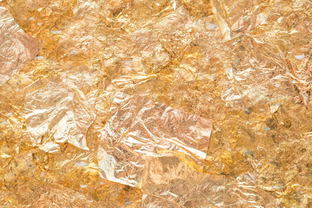 Gold leaf on the wall background.