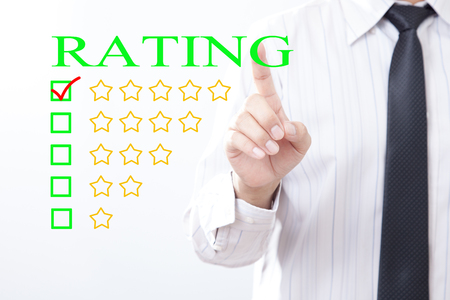 Businessman click concept Rating message,  Five golden stars.の写真素材