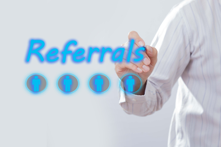 Businessman writing, drawing on the screen and empty spaceの写真素材