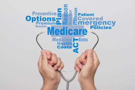 Health Care Concept. Doctor hands holding a stethoscope and wordの写真素材
