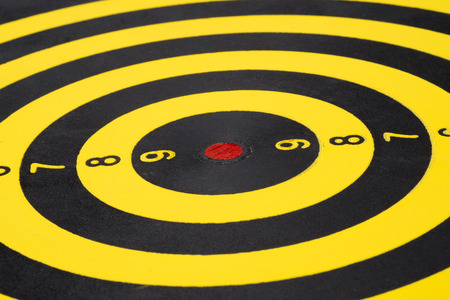Close up of dartboard on white background. Business Success Concept