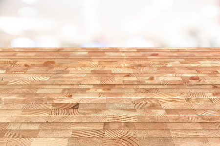 Empty wooden table on top over blur background, can be used mock up for montage products display or design layout.の写真素材