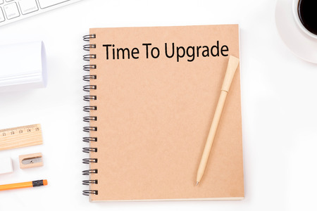 Time to upgrade word with modern workplace on white background.の写真素材