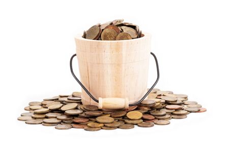 Wooden bucket and coins on white background.Time to invest, time value for money, family planning, money saving, finance saving and investment concept.の写真素材
