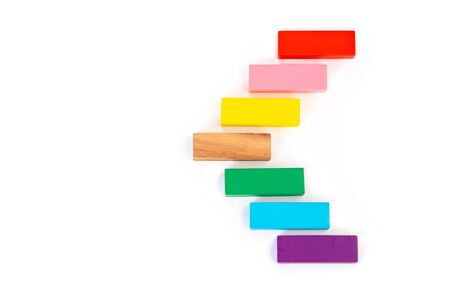 Abstract wooden block on white background. Symbol of leadership, teamwork and different. Business...