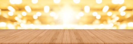 wooden pine table on top over blur background, can be used mock up for montage products display or...
