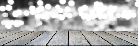 wooden pine table on top over blur background, can be used mock up for montage products display or...