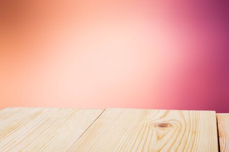 Perspective empty wooden table on top over blur background, can be used mock up for montage products...
