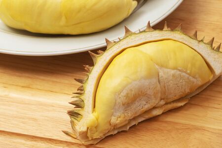 Durian, King of fruits, durian on wooden background.