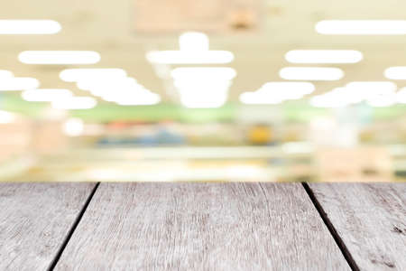 Perspective empty wooden table on top over blur background, can be used mock up for montage products display or design layout.の写真素材