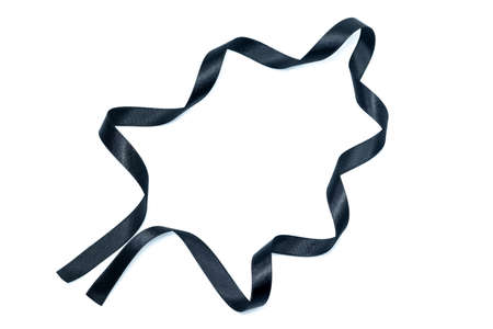 Beautiful black ribbon twist spiral isolated on white background.の写真素材