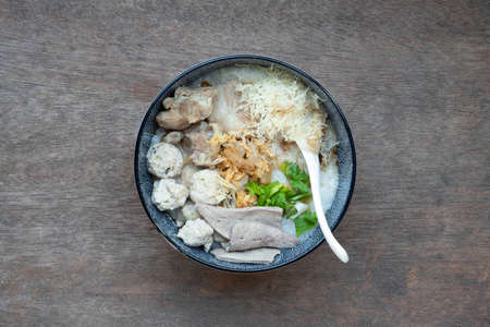 Boiled rice with pock, boiled pork liver, braised pork ribs,minced pork, coriander, spring onion...