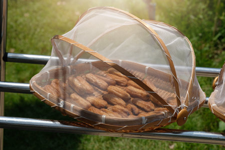 Dried bananas. Food preservation. Dry Namwa bananas in the sun for 4-5 days.の写真素材