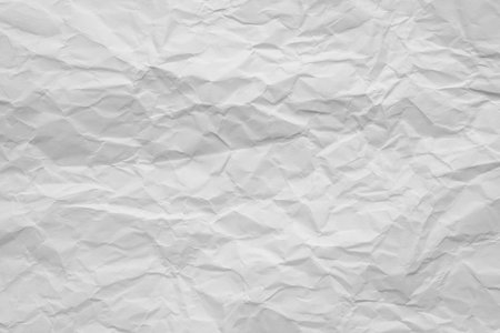 Texture of white crumpled paper for background.の写真素材