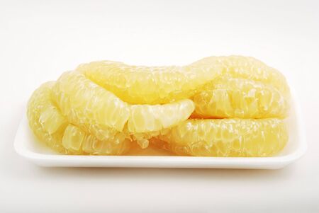 pomelo citrus isolated on white の写真素材