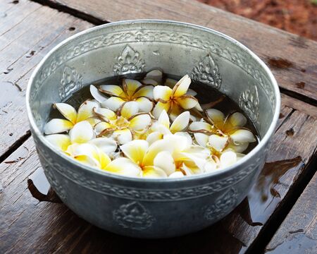 Flowers floating in waterの写真素材