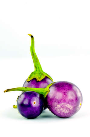 round eggplant isolated on  white backgroundの写真素材